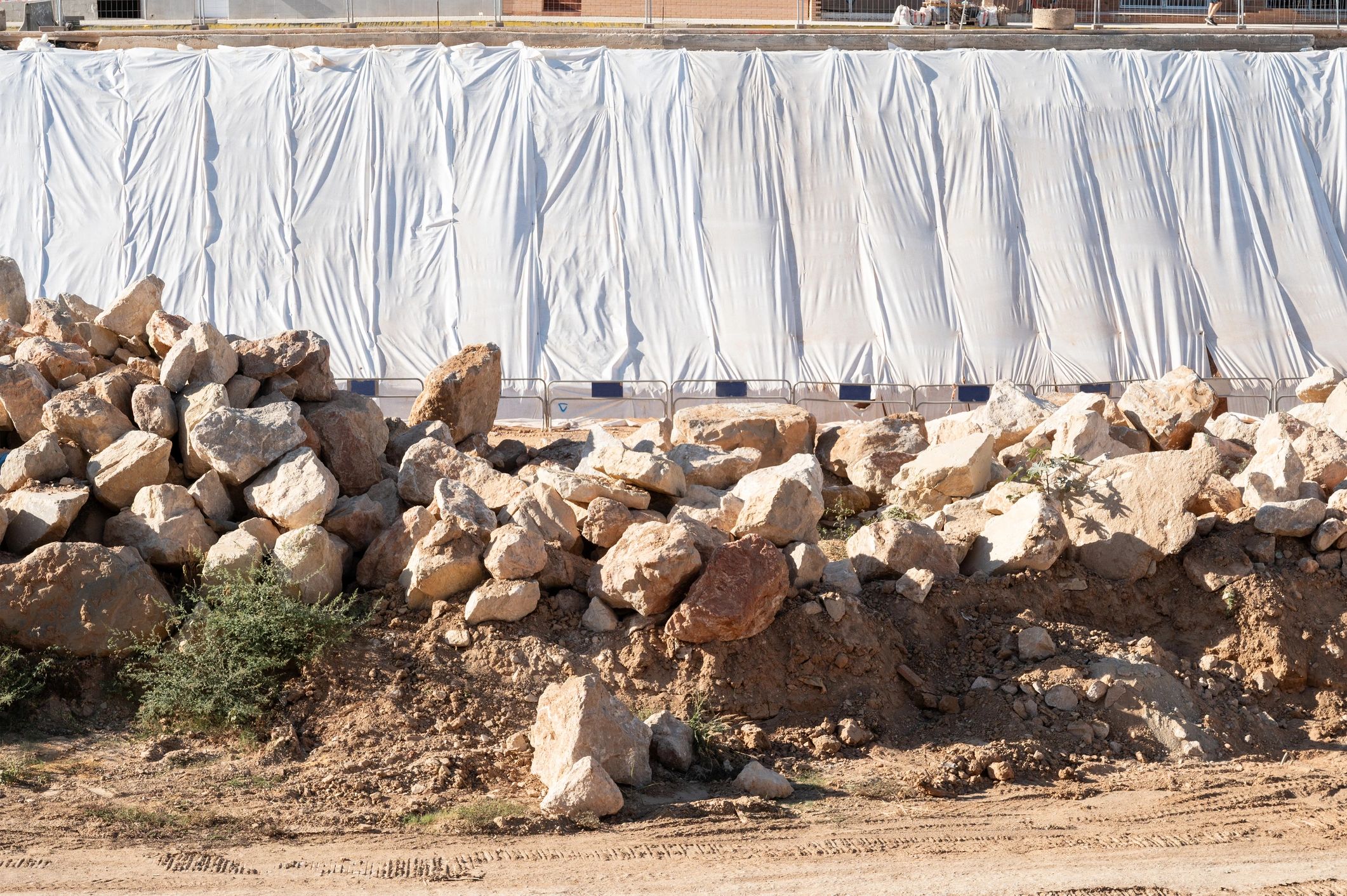 Retaining wall construction project on a commercial-style site